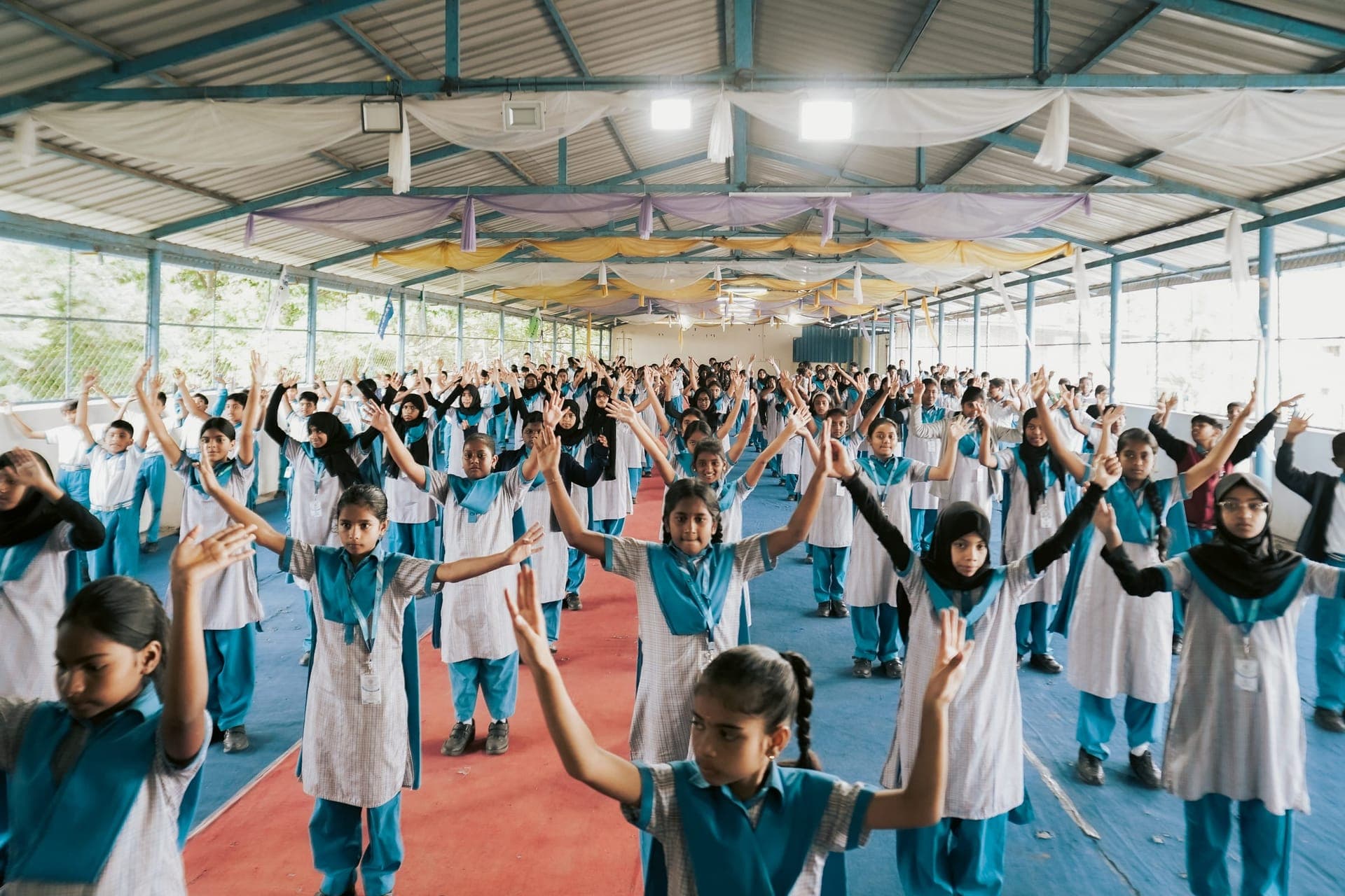 A large group of students and staff during a school activity